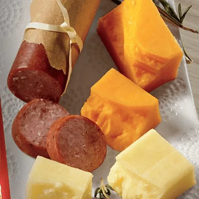 The Swiss Colony 26 Surefire Pleasers - Assorted Holiday Treats with Ham Summer Sausages, Chocolates, Cheese Bars and Logs, and Candy