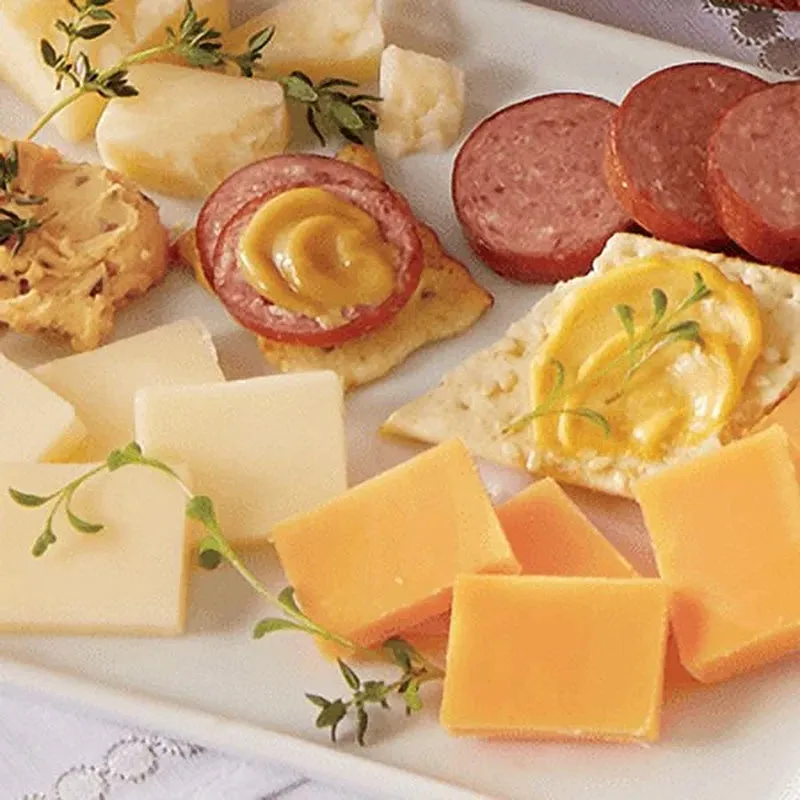 The Swiss Colony 26 Surefire Pleasers - Assorted Holiday Treats with Ham Summer Sausages, Chocolates, Cheese Bars and Logs, and Candy